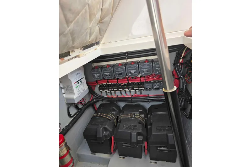 Slide: The Image of Electrical system of 2008 Intrepid 430 Sport Yacht with batteries and wiring. - 52
