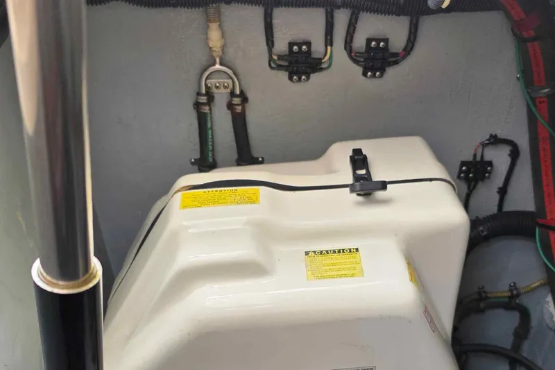 Slide: The Image of Engine compartment of a 2008 Intrepid 430 Sport Yacht, showing wiring and components. - 53