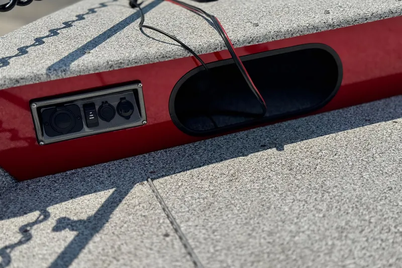 Slide: The Image of 2024 Apex Outlander V2010 boat dashboard with control panel and wiring. - 9