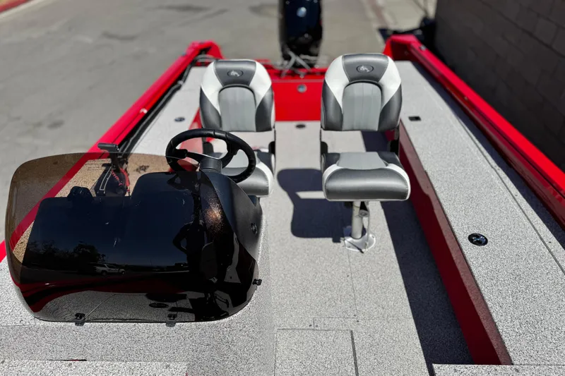 Slide: The Image of 2023 Apex Polar Kraft V186 boat interior with dual seats and steering console. - 16