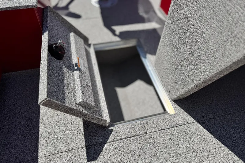 Slide: The Image of Open storage compartment on 2023 Apex Polar Kraft V186 boat deck. - 15