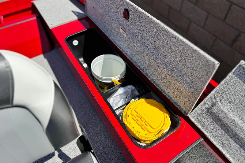 Slide: The Image of Storage compartment in 2023 Apex Polar Kraft V186 boat, featuring organized gear and accessories. - 18