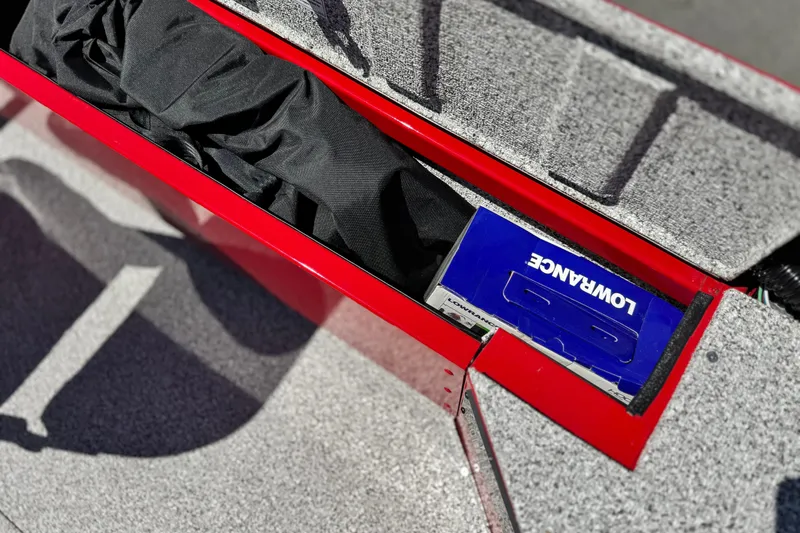 Slide: The Image of Storage compartment in 2023 Apex Polar Kraft V186 boat with Lowrance equipment. - 19