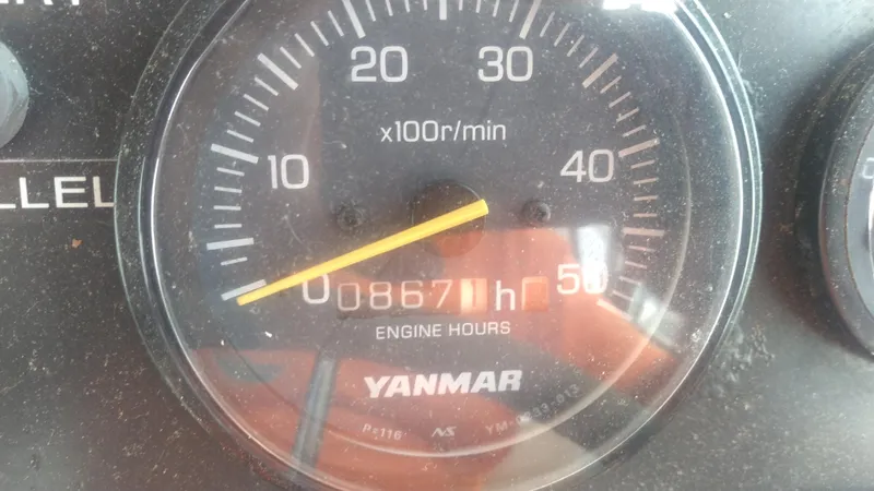 Slide: The Image of Close-up of a Yanmar engine hour meter showing 867 hours on a Bruckmann BLUESTAR 29, 1998 model. - 18