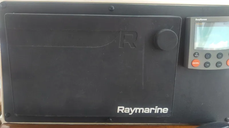 Slide: The Image of Raymarine navigation system on 1998 Bruckmann BLUESTAR 29 boat dashboard. - 20