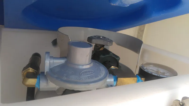 Slide: The Image of Close-up of a 1998 Bruckmann BLUESTAR 29 boat's gas regulator and gauge system. - 30