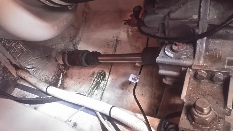 Slide: The Image of Engine compartment of 1998 Bruckmann BLUESTAR 29, showing mechanical components and wiring. - 31