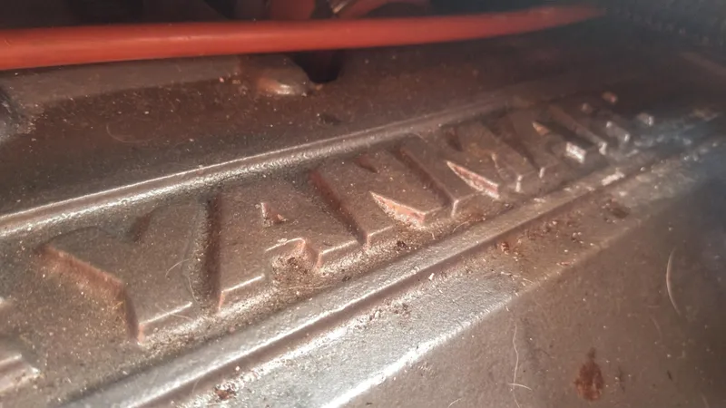 Slide: The Image of Close-up of a Yanmar engine in a 1998 Bruckmann BLUESTAR 29 boat. - 33