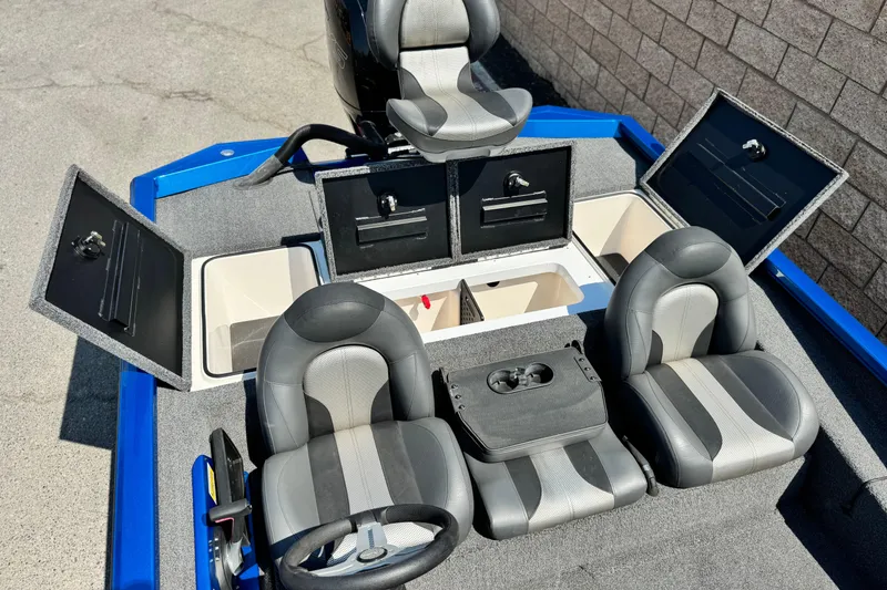 Slide: The Image of 2021 Vexus AVX1980 boat interior with open storage compartments and seating. - 15