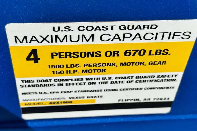 Slide: The Image of U.S. Coast Guard capacity label for 2021 Vexus AVX1980 boat, 4 persons or 670 lbs. - 20