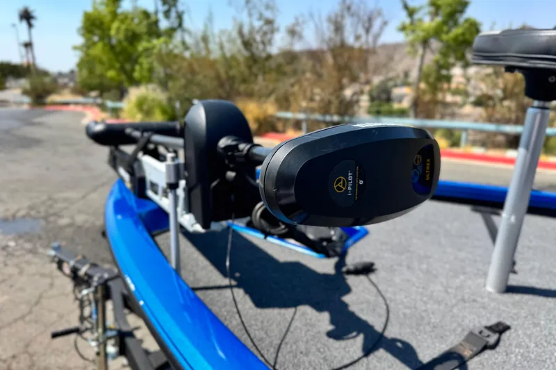 Slide: The Image of 2021 Vexus AVX1980 boat with i-Pilot trolling motor, parked outdoors. - 8