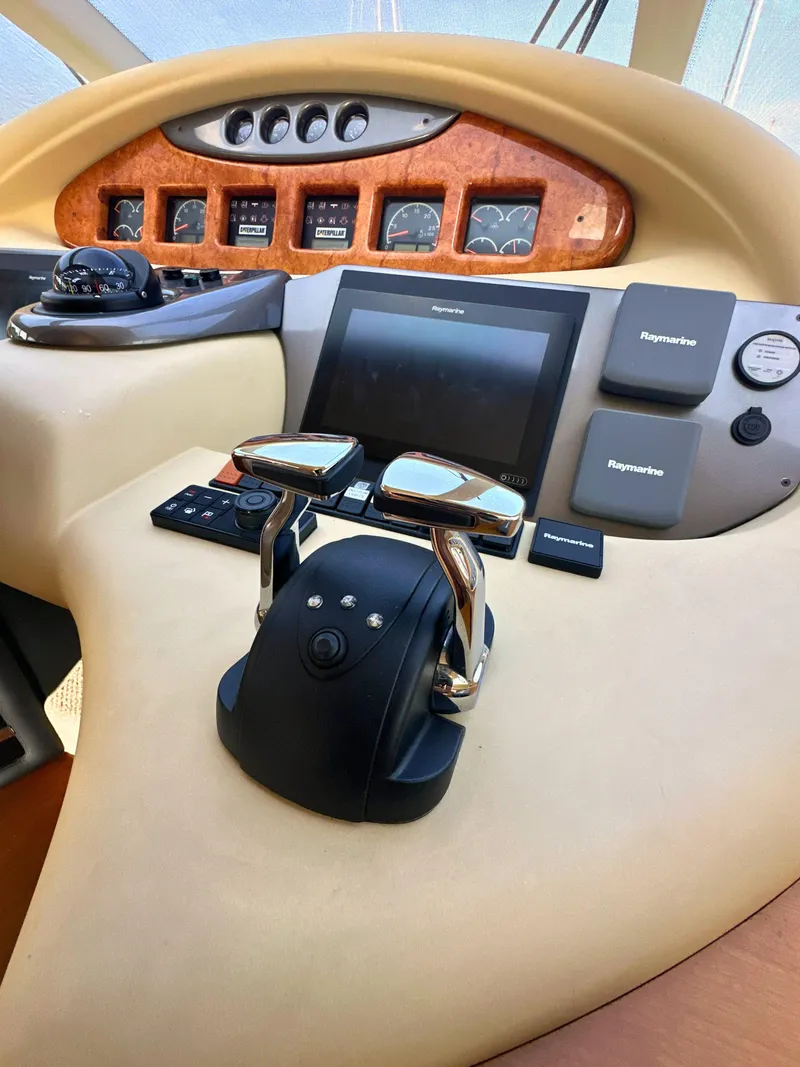 Slide: The Image of Control panel of a 2010 Azimut 55E yacht with navigation instruments. - 18
