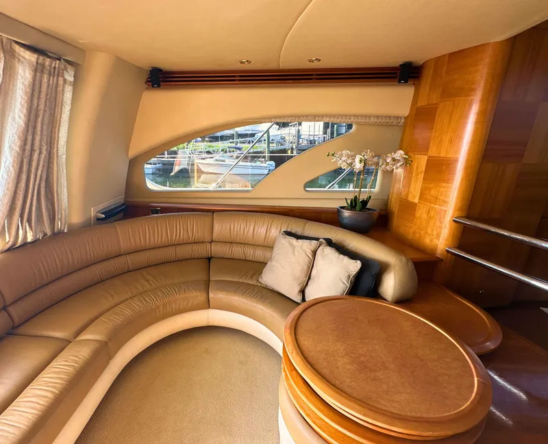 Slide: The Image of Luxurious interior of a 2010 Azimut 55E yacht with leather seating and elegant decor. - 37