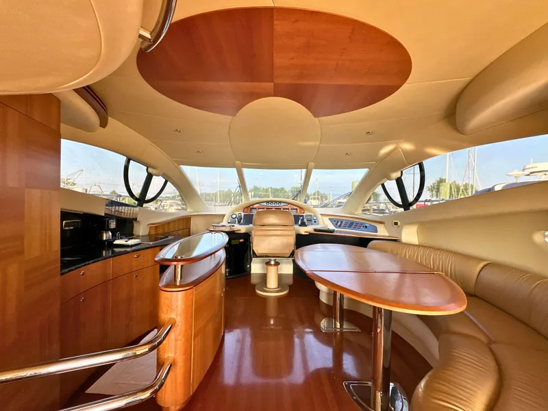 Slide: The Image of Luxurious interior of a 2010 Azimut 55E yacht with elegant wood finishes. - 8