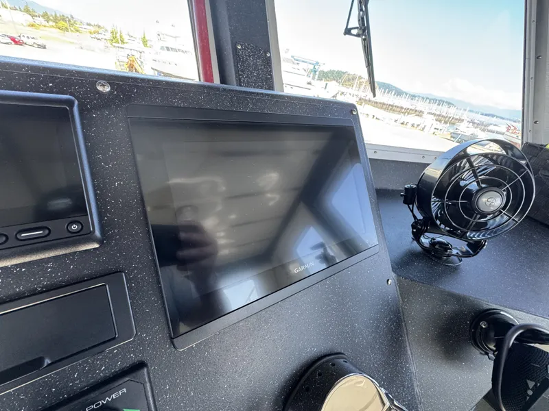 Slide: The Image of Control panel of 2020 Aluminum Cruiser 42' Trawler with Garmin display and fan. - 17