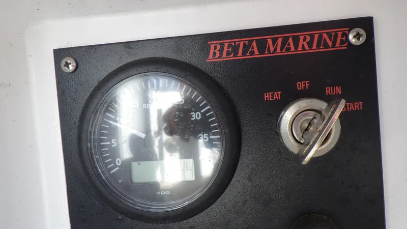 Slide: The Image of Beta Marine control panel with tachometer and ignition switch, Bristol 35.5, 1982 model. - 19