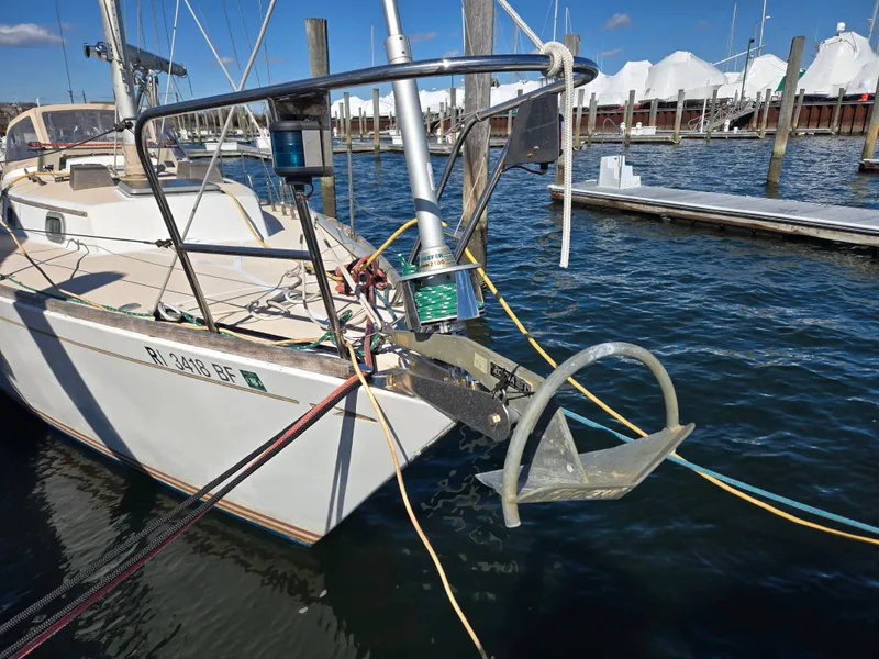 Slide: The Image of 1982 Bristol 35.5 sailboat docked, featuring anchor and rigging details. - 4