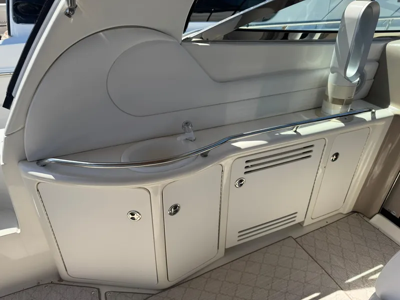 Slide: The Image of 2001 Sea Ray 380 Sundancer interior with sleek cabinetry and modern design. - 15