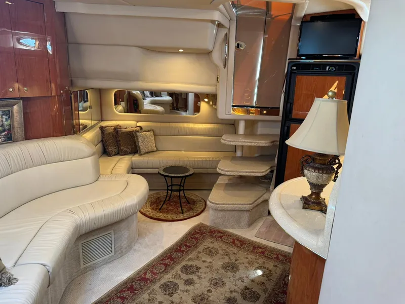 Slide: The Image of Luxurious interior of a 2001 Sea Ray 380 Sundancer yacht with elegant furnishings. - 18