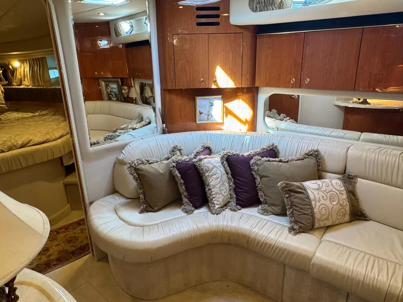 Slide: The Image of Luxurious interior of 2001 Sea Ray 380 Sundancer with plush seating and elegant decor. - 20