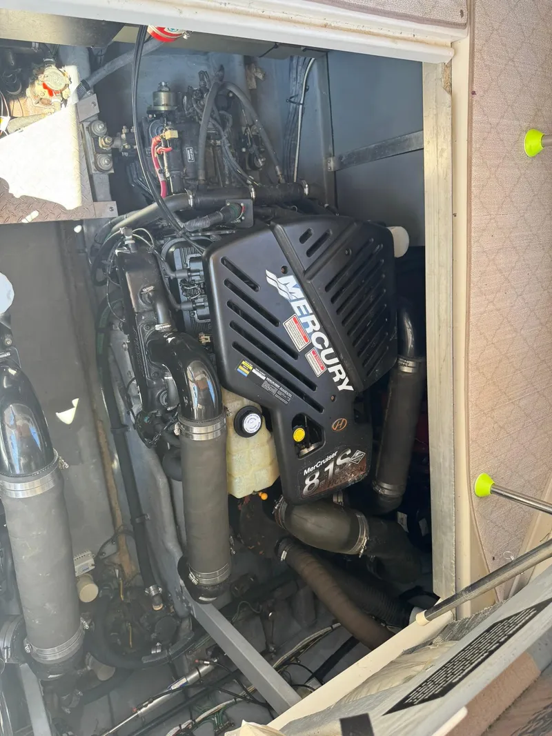 Slide: The Image of Engine compartment of a 2001 Sea Ray 380 Sundancer with Mercury 8.1L engine. - 34