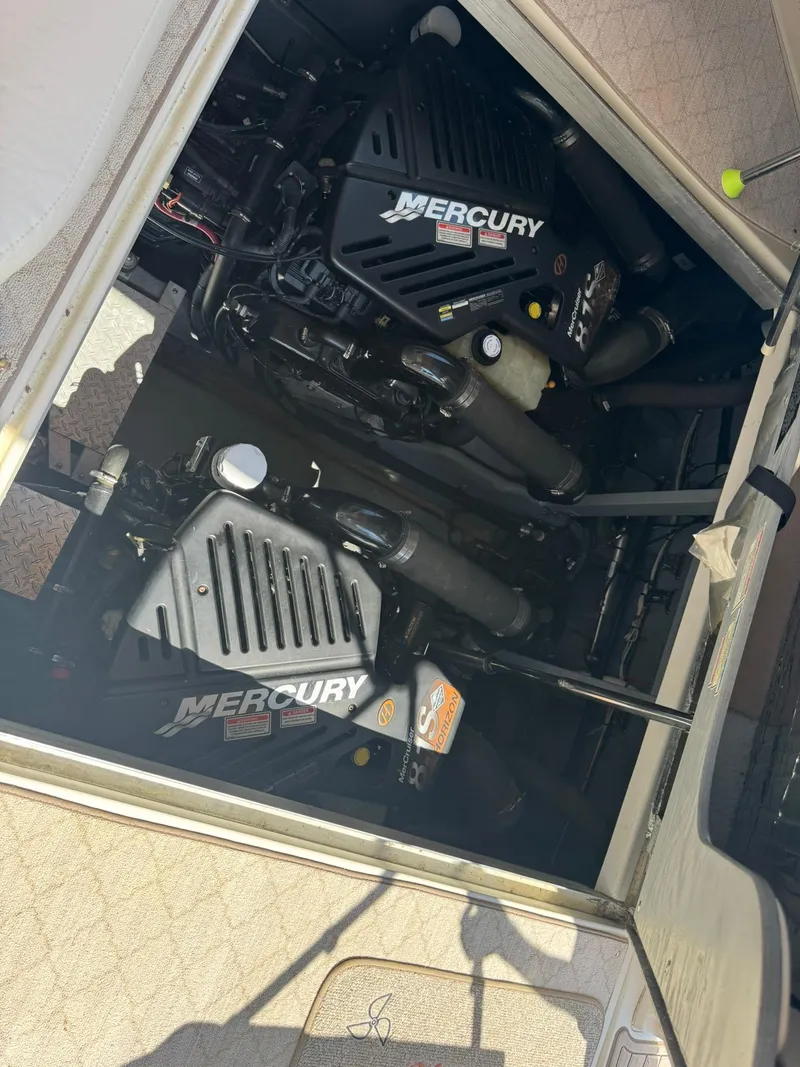 Slide: The Image of Engine compartment of a 2001 Sea Ray 380 Sundancer with Mercury engines. - 35