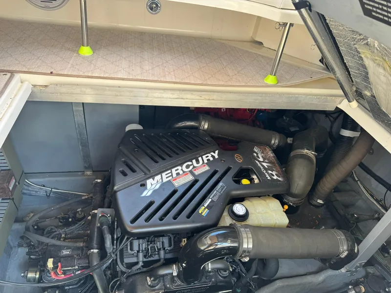 Slide: The Image of Engine compartment of a 2001 Sea Ray 380 Sundancer with a Mercury engine. - 37