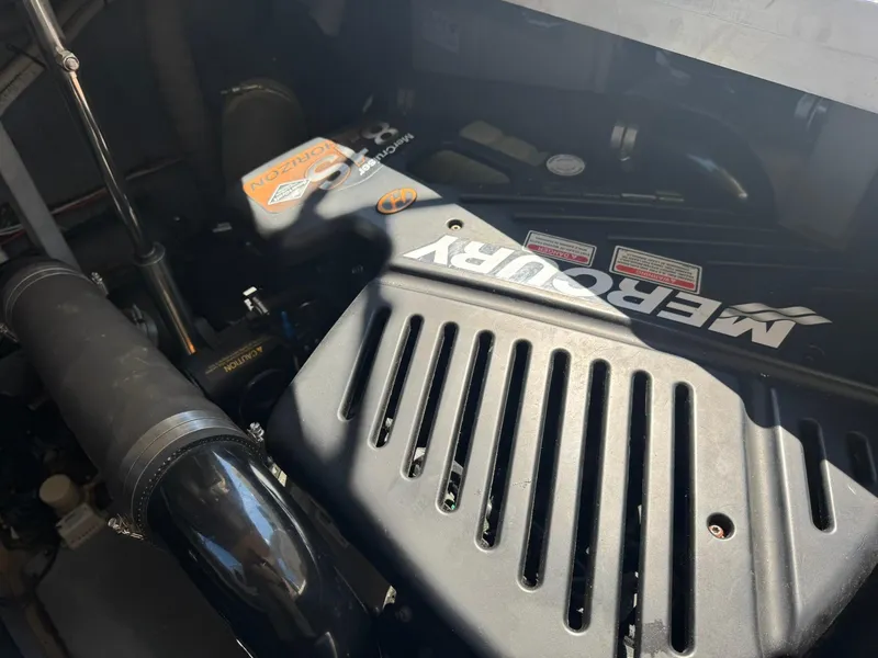 Slide: The Image of Engine compartment of a 2001 Sea Ray 380 Sundancer with Mercury components. - 39