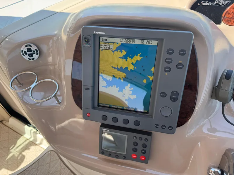 Slide: The Image of Navigation system on 2001 Sea Ray 380 Sundancer boat dashboard. - 6