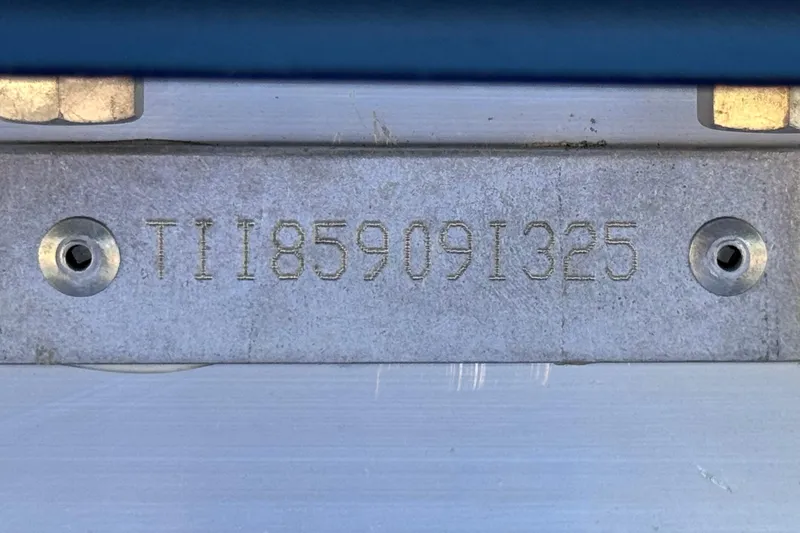 Slide: The Image of Serial number plate on 2025 Manitou Explore 24 Navigator. - 30