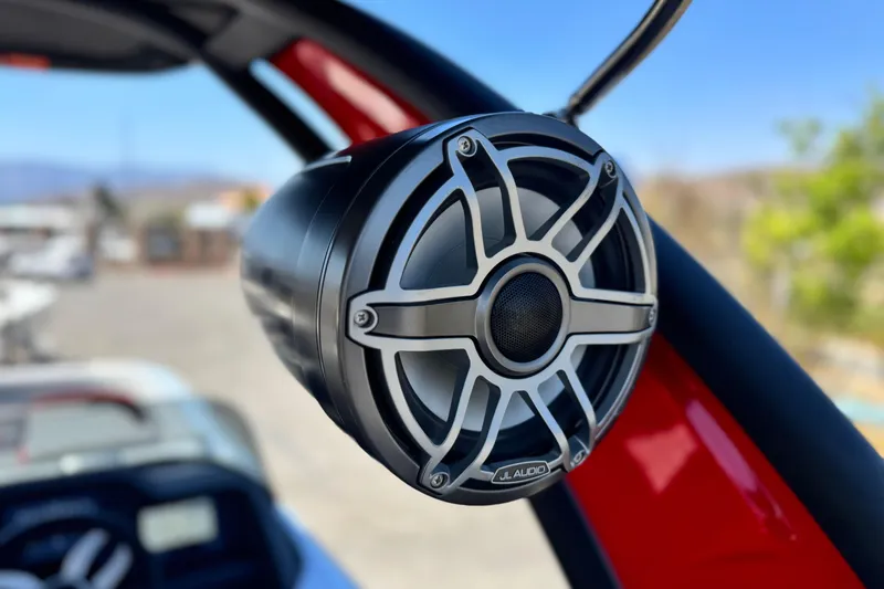 Slide: The Image of Close-up of JL Audio speaker on 2023 Manitou 25 XT RFXW boat. - 20
