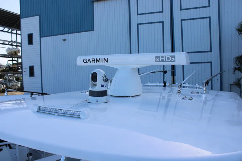 Slide: The Image of Radar and camera equipment on 1998 Venture 34 Open boat. - 12