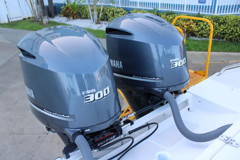 Slide: The Image of Twin Yamaha 300 outboard engines on a 1998 Venture 34 Open boat. - 9