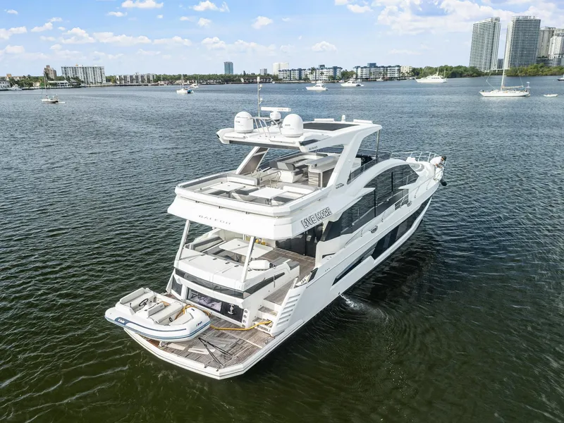 Slide: The Image of Luxury 2021 Galeon 680 Fly yacht cruising on a scenic waterfront. - 31