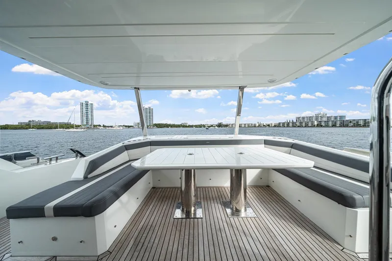 Slide: The Image of Luxury seating area on 2021 Galeon 680 Fly yacht with scenic waterfront view. - 44