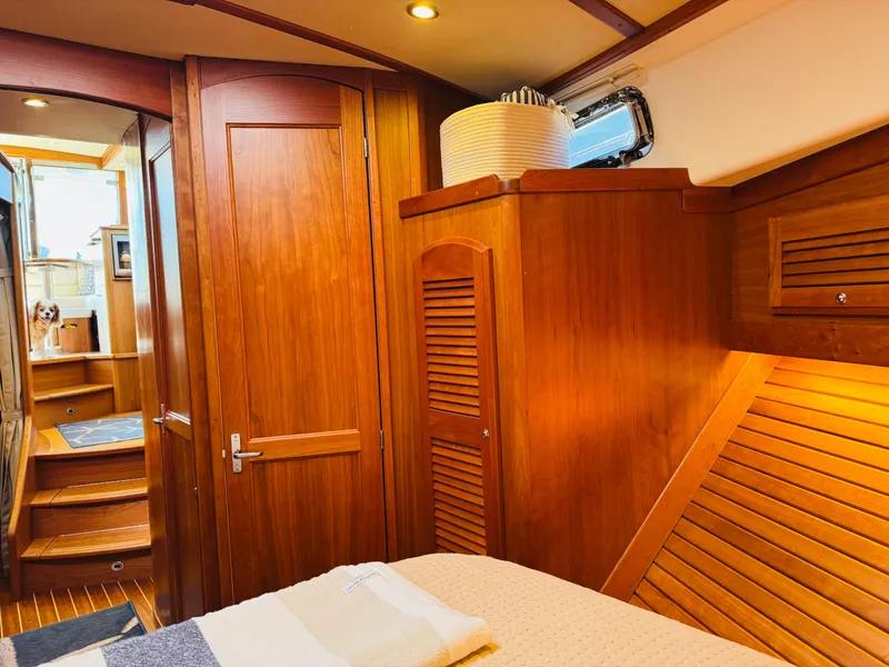 Slide: The Image of Luxurious interior of 2018 Sabre 42 Salon Express yacht with wooden finishes and cozy ambiance. - 22