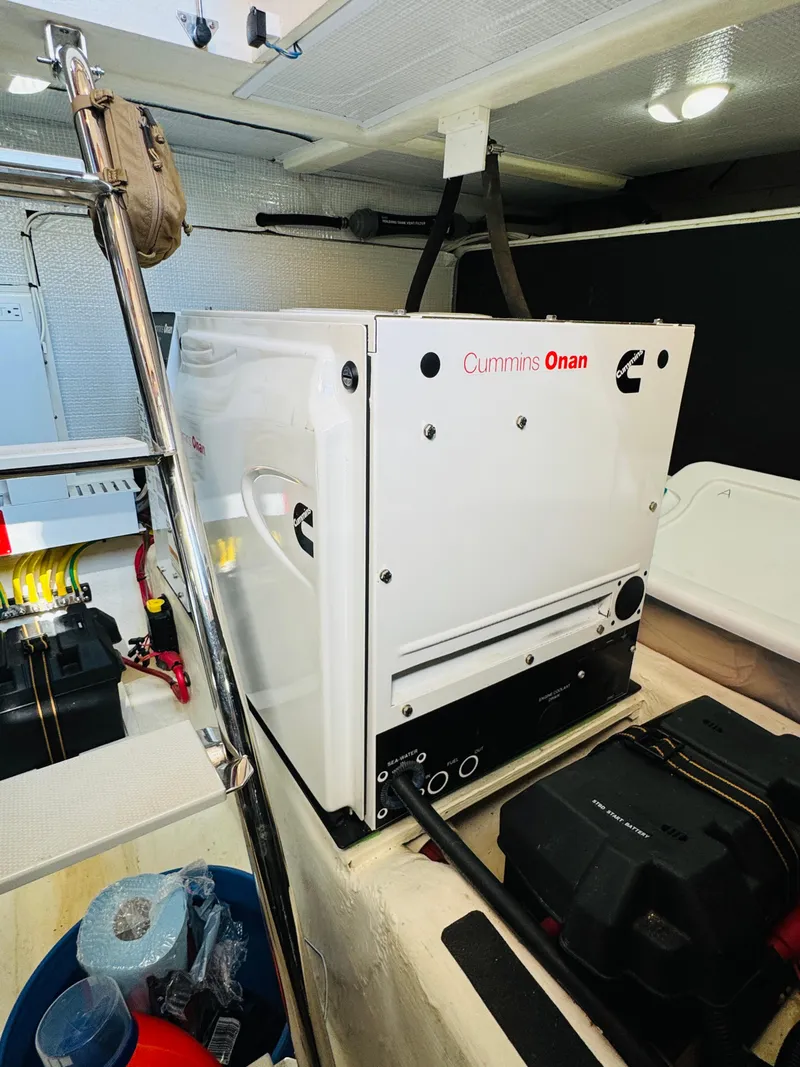 Slide: The Image of Cummins Onan generator in 2018 Sabre 42 Salon Express engine room. - 40