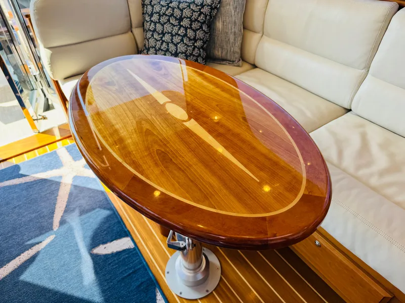 Slide: The Image of Luxurious wooden table in 2018 Sabre 42 Salon Express yacht interior. - 46