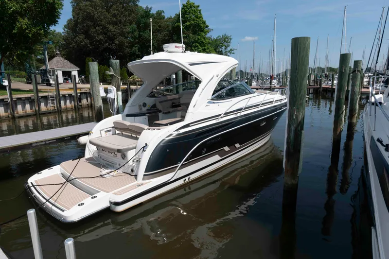 The Image of 2018 Formula 34 PC yacht docked at a marina on a sunny day. - 0