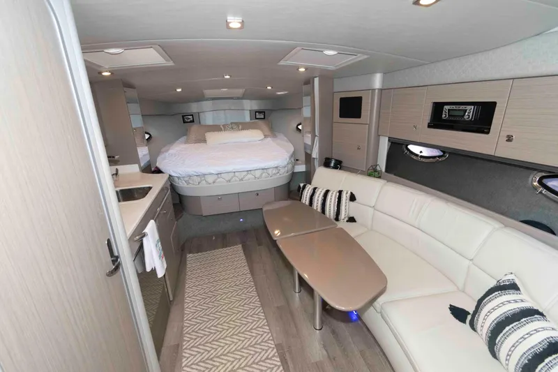 Slide: The Image of Interior of 2018 Formula 34 PC yacht with modern furnishings and cozy seating area. - 13