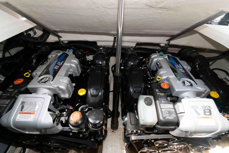 Slide: The Image of Twin V8 engines in a 2018 Formula 34 PC boat engine compartment. - 19