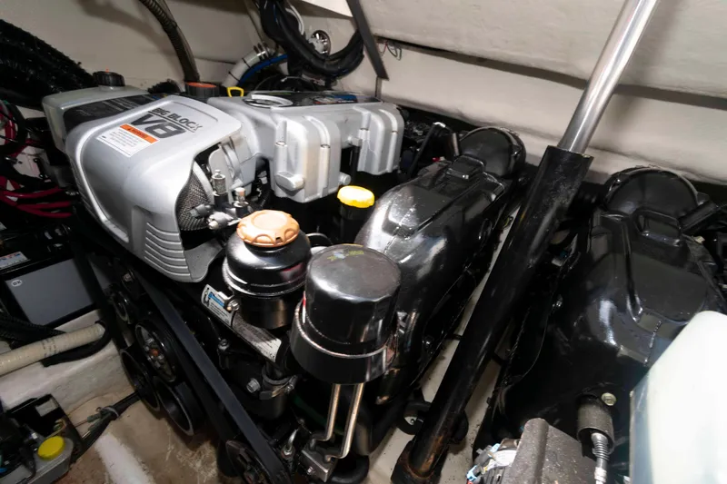 Slide: The Image of Engine compartment of a 2018 Formula 34 PC boat, featuring a powerful V8 engine. - 20