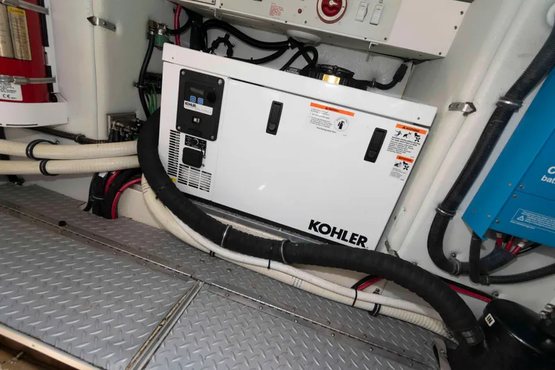 Slide: The Image of Engine room of 2018 Formula 34 PC with Kohler generator and wiring. - 22