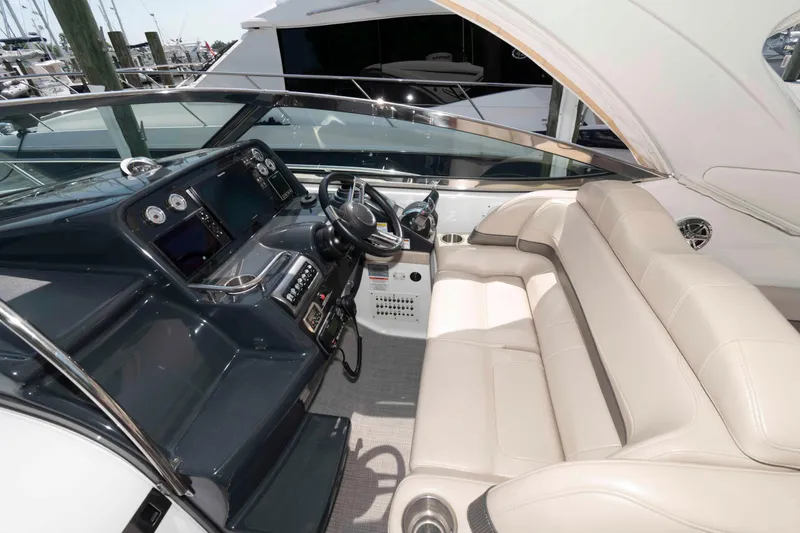 Slide: The Image of 2018 Formula 34 PC yacht interior with modern dashboard and luxurious seating. - 7