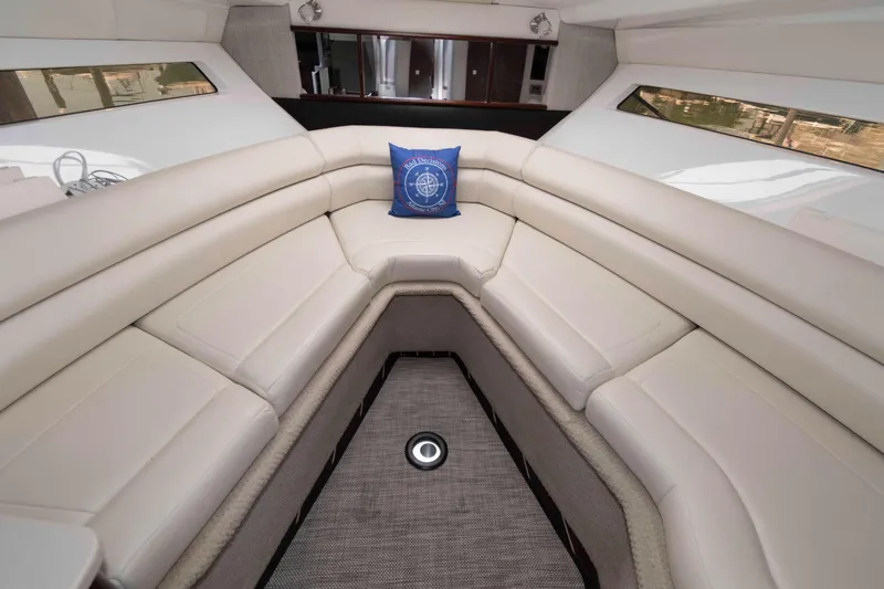 Slide: The Image of Luxurious interior of 2018 Monterey 295 Sport Yacht with plush seating and nautical decor. - 14