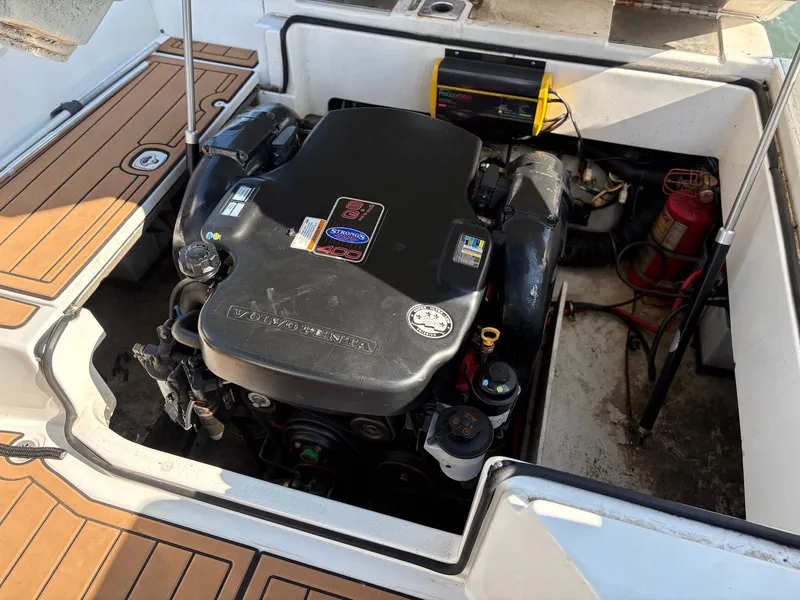 Slide: The Image of Volvo Penta engine in 2012 Cobalt A28 boat, open engine compartment view. - 32