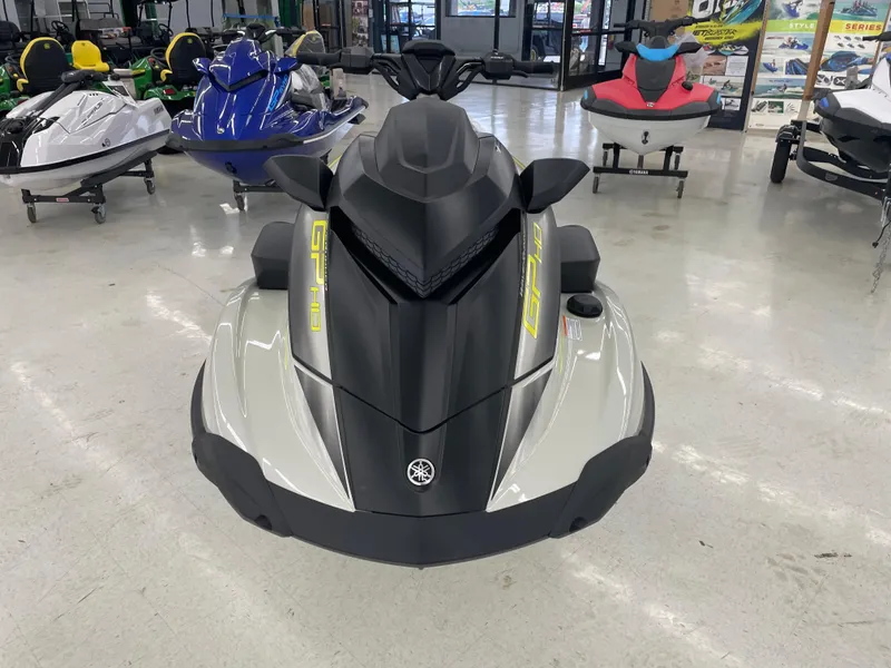 Slide: The Image of 2025 Yamaha WaveRunner GP HO jet ski displayed in showroom. - 2