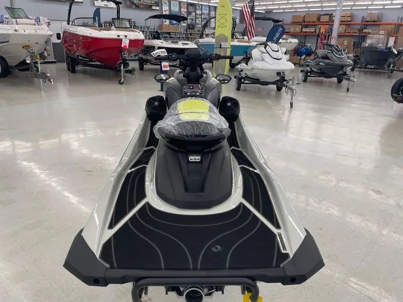 Slide: The Image of 2025 Yamaha WaveRunner GP HO displayed in a showroom with other watercraft. - 6