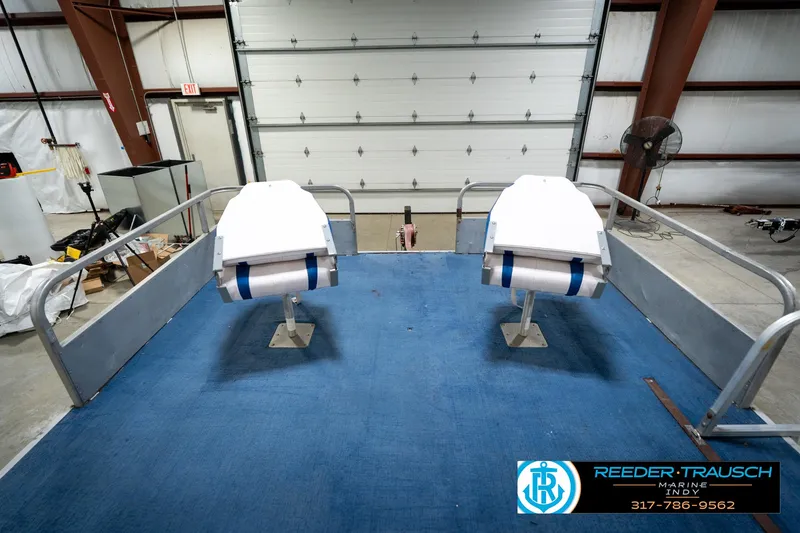 Slide: The Image of Steering wheel of a 1988 Landau 20 Adventurer boat, featuring control panel and dashboard. - 25