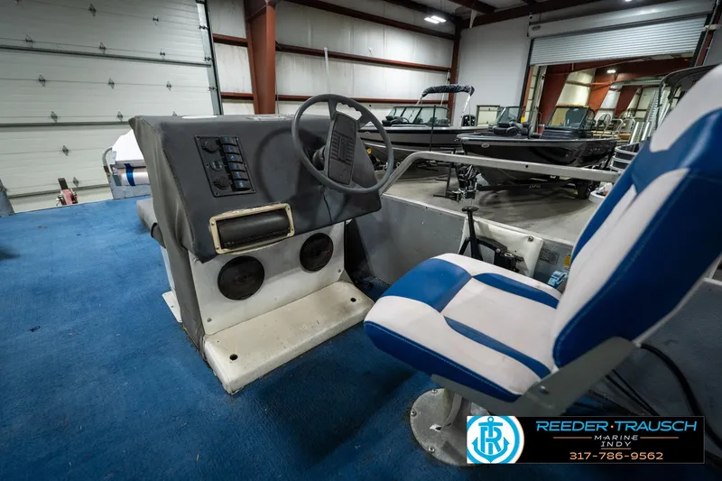 Slide: The Image of Close-up of 1988 Landau 20 Adventurer boat control panel with throttle lever. - 28